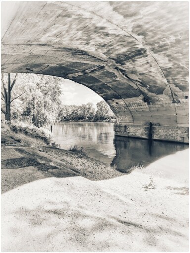 It's a photograph of the underside of a bridge, but the way that the arch from the bridge meet with the skyline, it's just very strange and it gives this very strange juxtaposition and it looks almost like a gorilla's head popping out. 